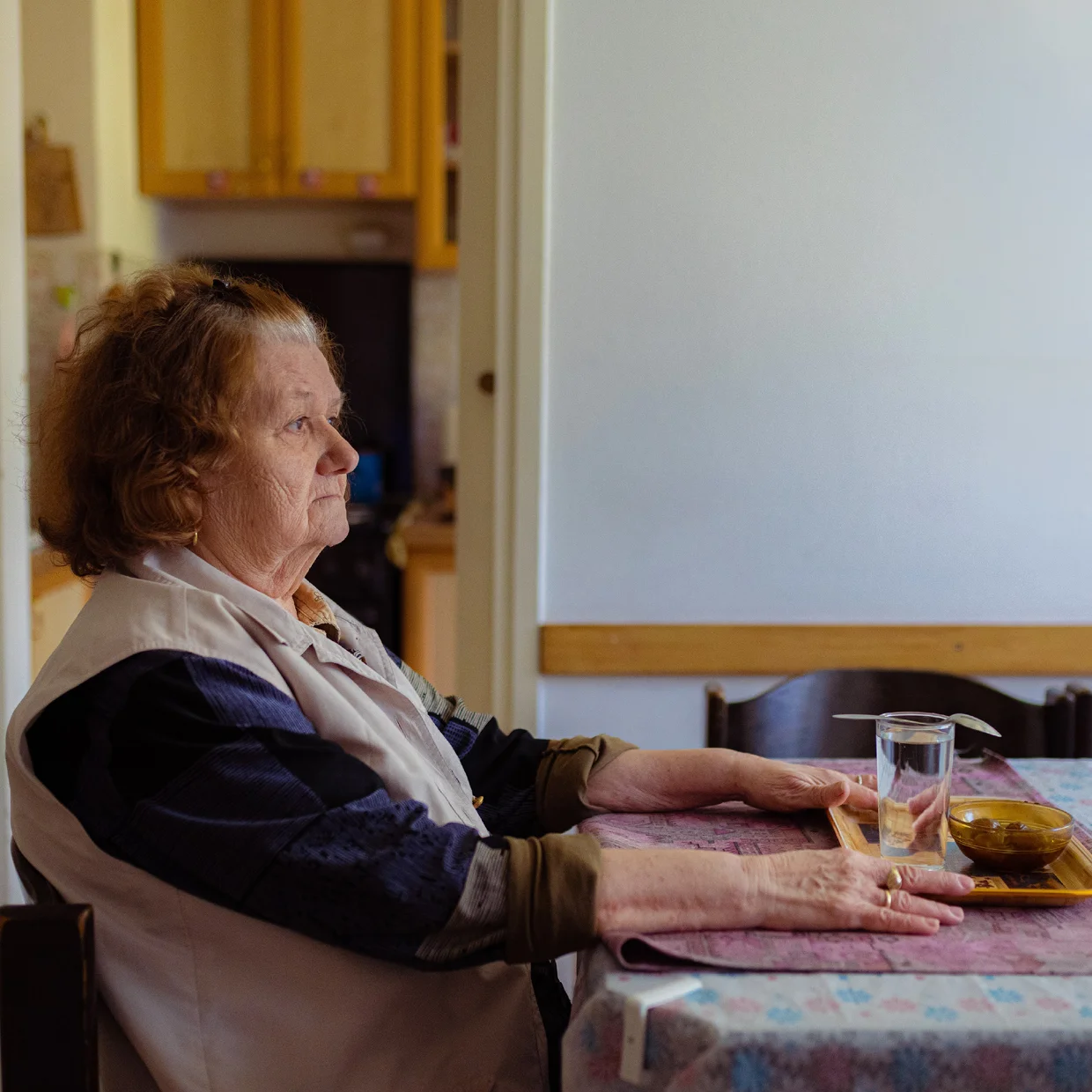 Female client siting at dining room table