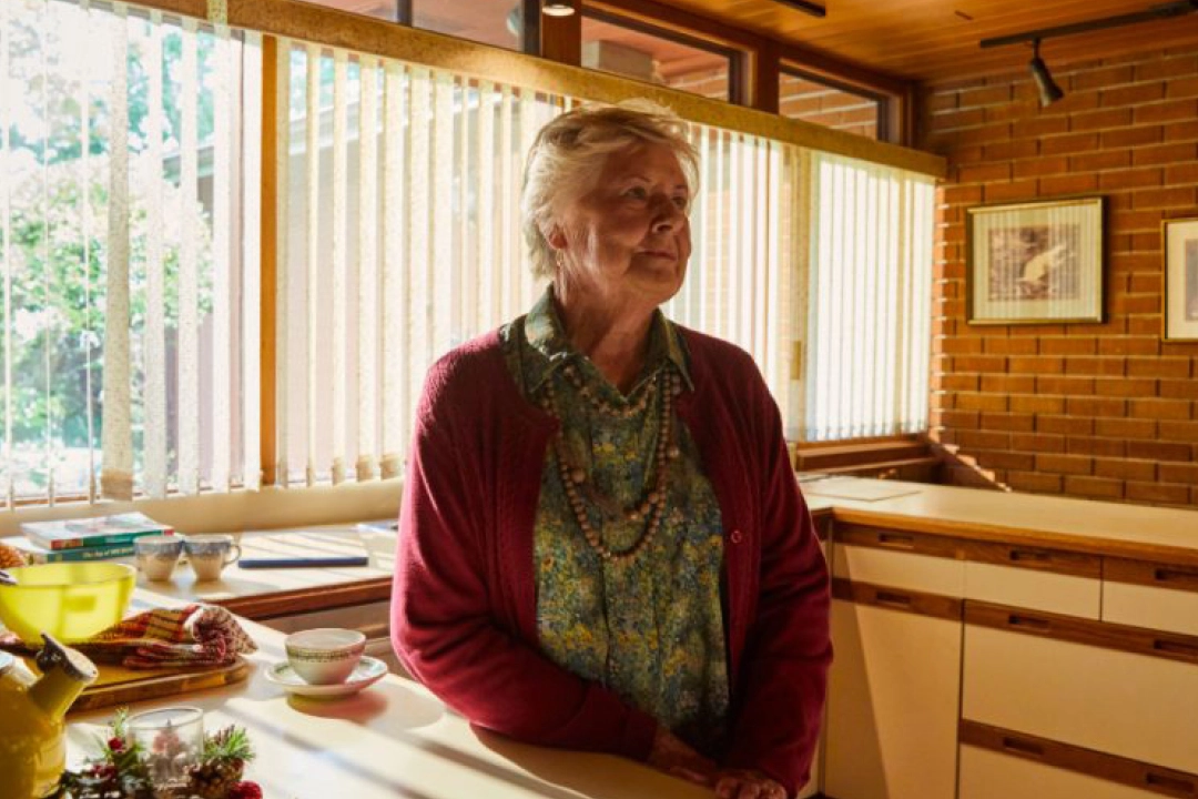 Meals on Wheels Client, Donna, standing in kitchen