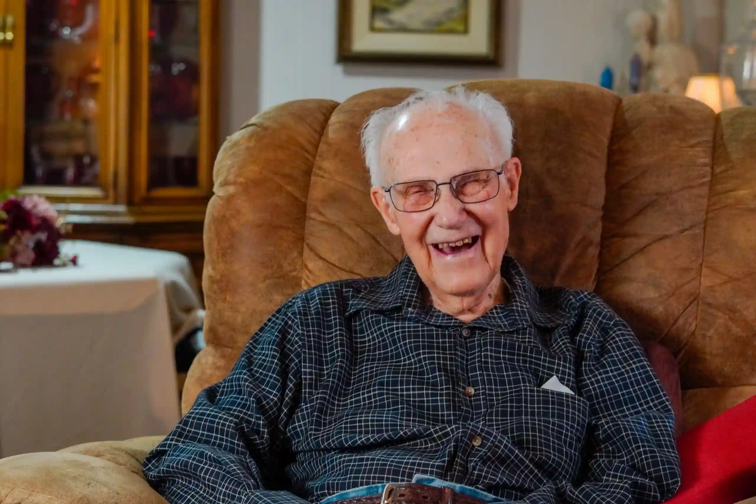 Man (Donald Sullivan) sitting in chair