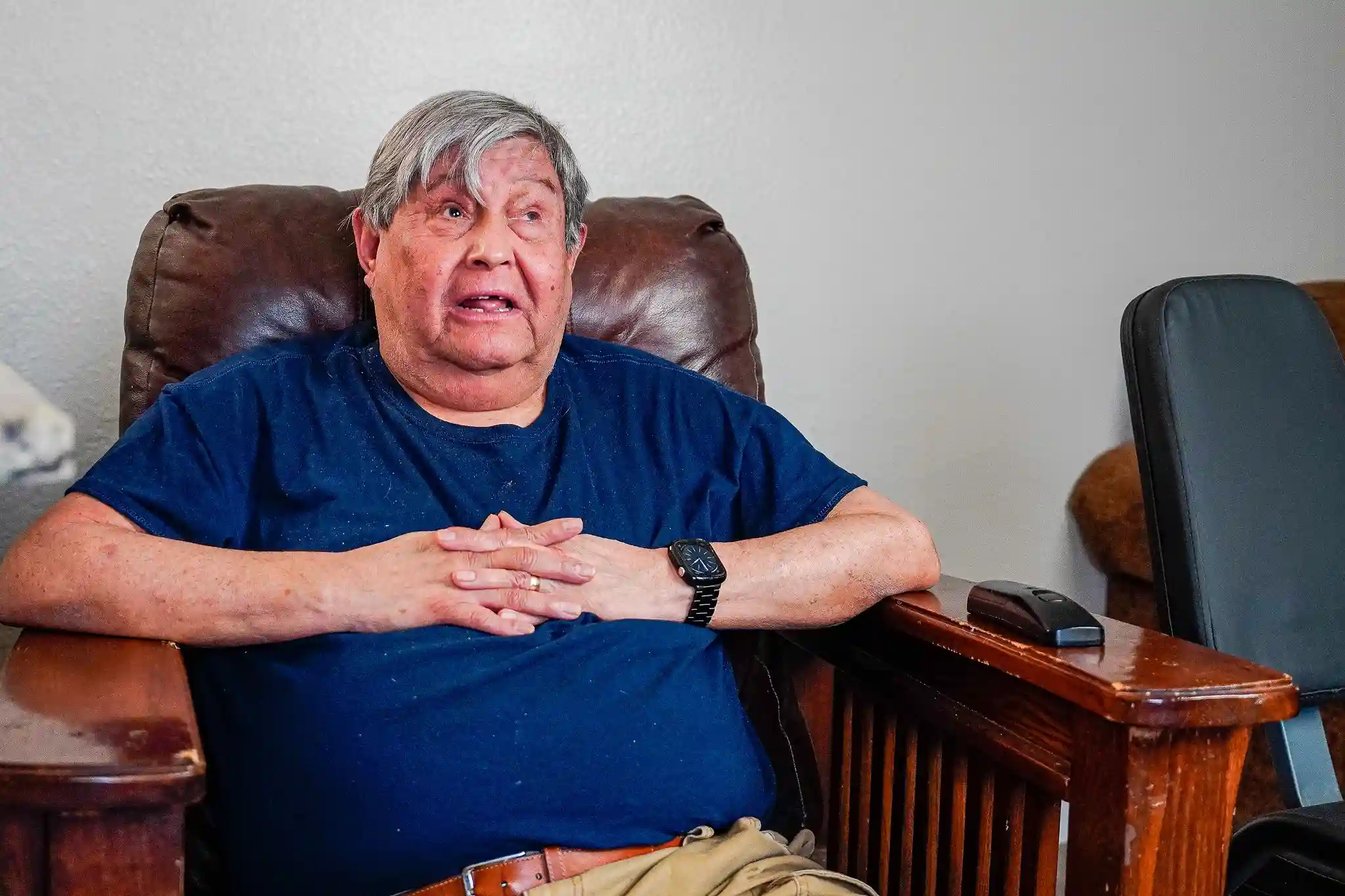 Robert Vinton talking while sitting in armchair.